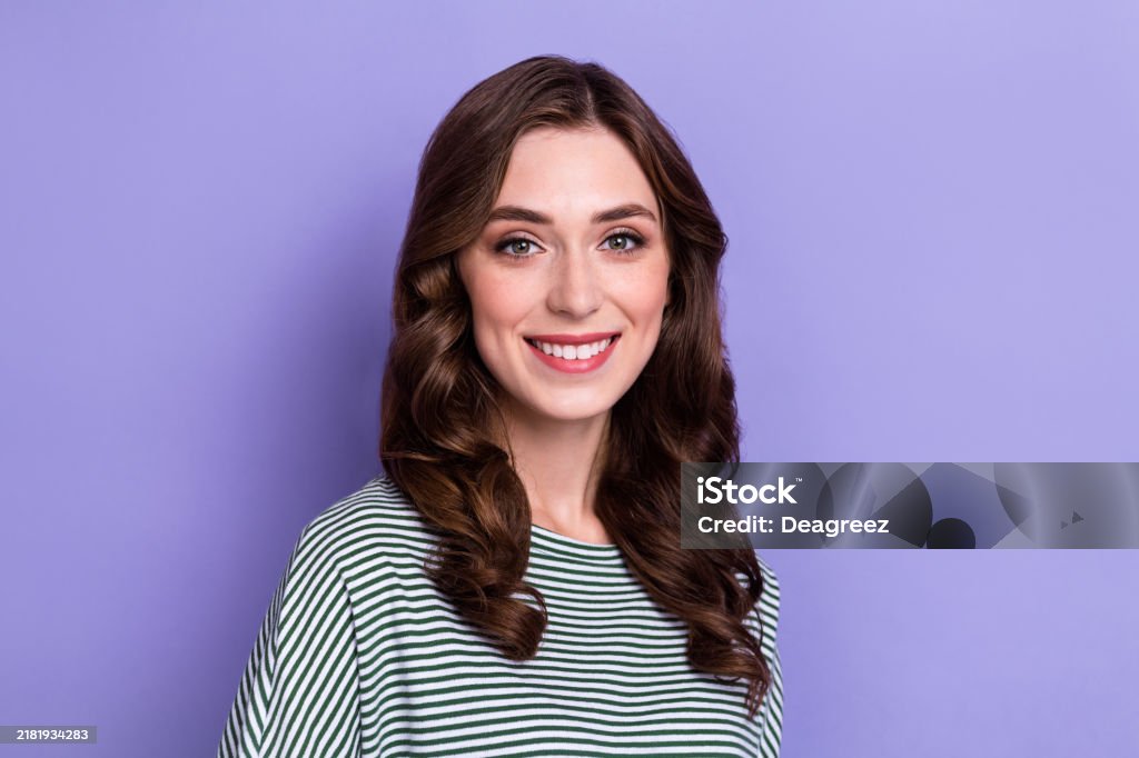 Closeup portrait of young adorable pretty lady wear cute stylish striped pullover nice smile wavy hair actress isolated on purple color background.